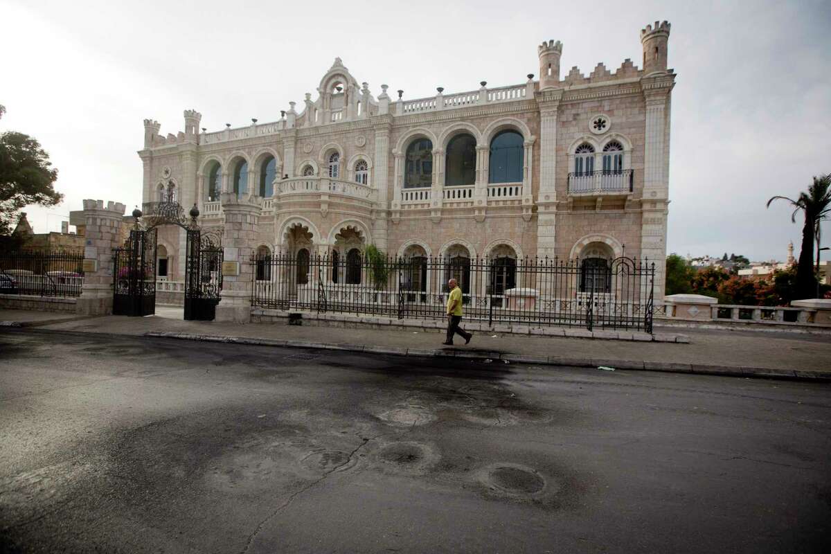 This Saturday, Nov. 28, 2015, photograph shows burnt tire marks in front of the Intercontinental hotel, in the West Bank town of Bethlehem. The century-old Jacir Palace hotel, with its soaring stone archways and wrought iron balconies, was once a symbol of Bethlehem’s wealth and tourism potential. Today, the property reflects the city’s dour mood ahead of the crucial Christmas season after months of unrest that has taken more than 100 lives, including a Palestinian waiter from the hotel.