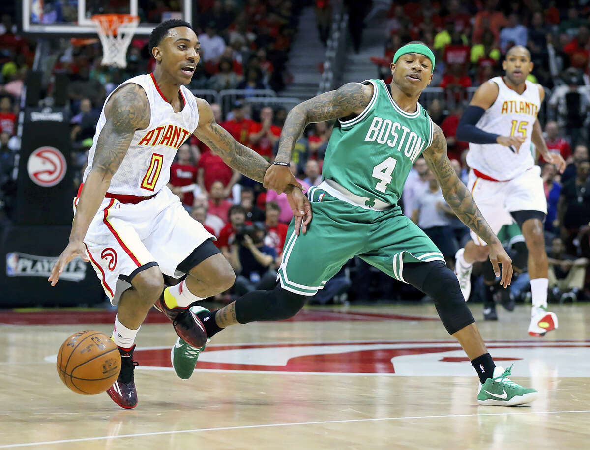 Hawks guard Jeff Teague drives against Celtics guard Isaiah Thomas during the first half on Tuesday.