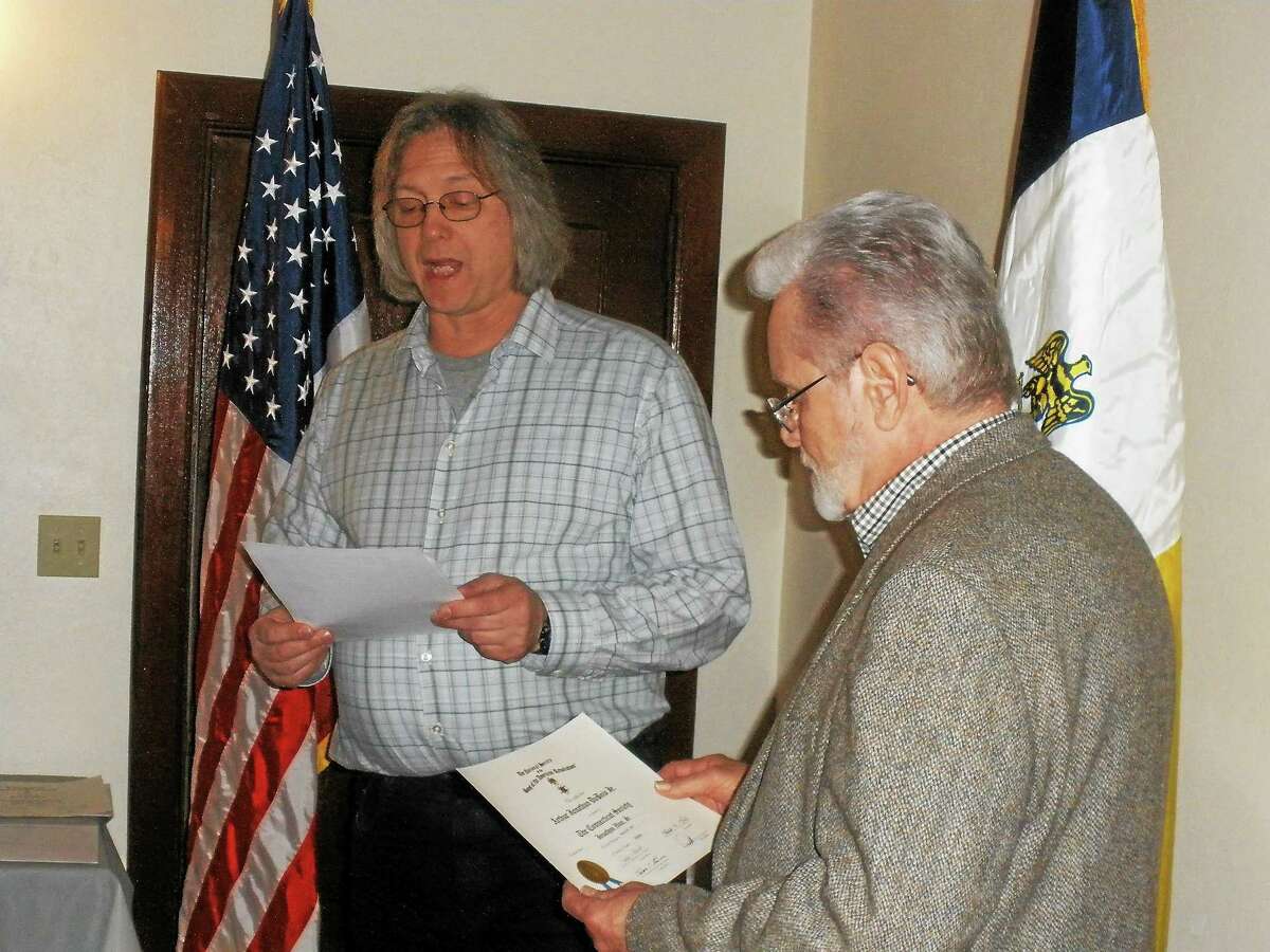 George Mills of Winsted and Arthur J. Dubois Jr. of Washington Depot become the newest members of the Sons of the American Revolution Gov. Oliver Wolcott Sr. Branch on Monday.