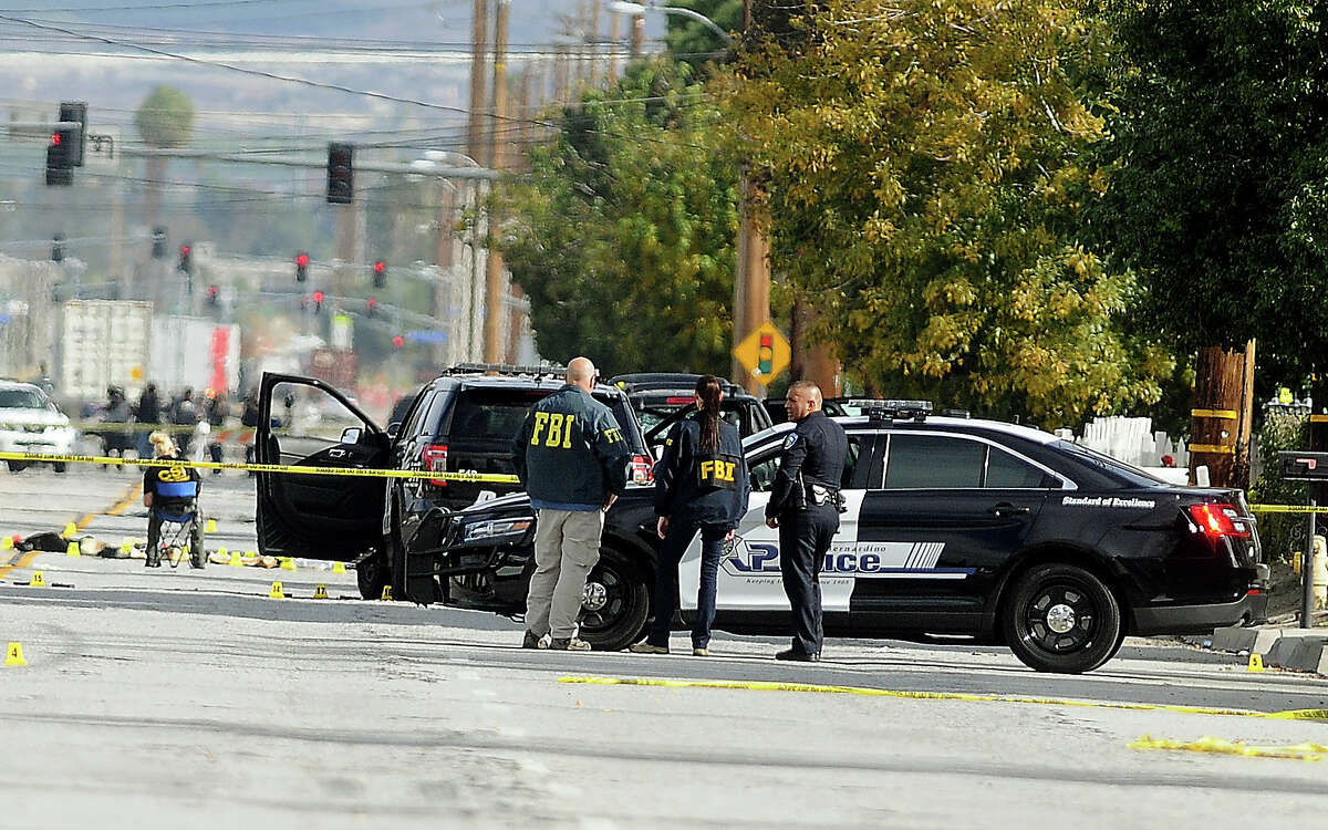 FBI, San Bernardino City and San Bernardino County Sheriff’s officials continue documenting and investigating on Thursday, Dec. 3, 2015, the scene of the shootout between law enforcement officials and the mass shooting suspects which occurred on Wednesday.