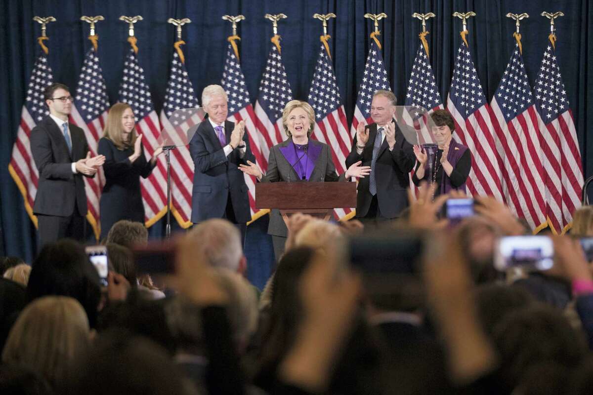 AP Photo/Matt Rourke Democratic presidential candidate Hillary Clinton, accompanied by, from left, son-in-law Marc Mezvinsky, daughter Chelsea Clinton, husband, former President Bill Clinton, vice presidential candidate, Sen. Tim Kaine, D-Va., and his wife Anne Holton, speaks in New York, Wednesday, Nov. 9, 2016. Clinton conceded the presidency to Donald Trump in a phone call early Wednesday morning, a stunning end to a campaign that appeared poised right up until Election Day to make her the first woman elected U.S. president.