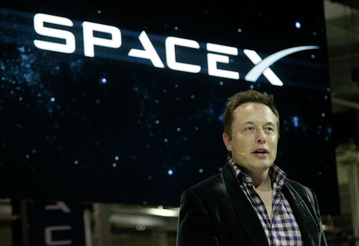 Elon Musk, CEO of SpaceX, introduces new Dragon V2 spacecraft at SpaceX facilities in Hawthorne, Calif., on May 29, 2014. Musk was a member of President Donald Trump's business brain trust, formed to help shape White House policy, but resigned after Trump announced withdrawal from the Paris climate accord. (Lawrence K. Ho/Los Angeles Times/TNS)