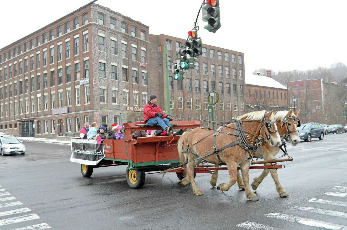 The horse-drawn carriage was one of the prime attractions at Winsted’s Christmas on Main Street in 2012. Sponsored by the Friends of Winsted, the event included a visit from Santa Claus, live music from The Gilbert School and holiday specials at many of the stores along Main.