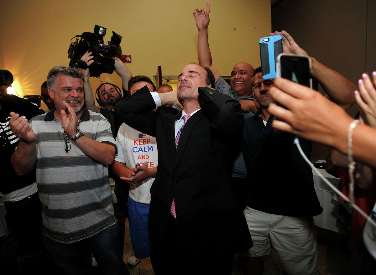 In this Sept. 16 file photo, former Bridgeport Mayor Joseph Ganim reacts after he enters Testo’s Restaurant in Bridgeport, after winning the Democratic mayoral primary. Ganim is scheduled to take the oath of office Tuesday.