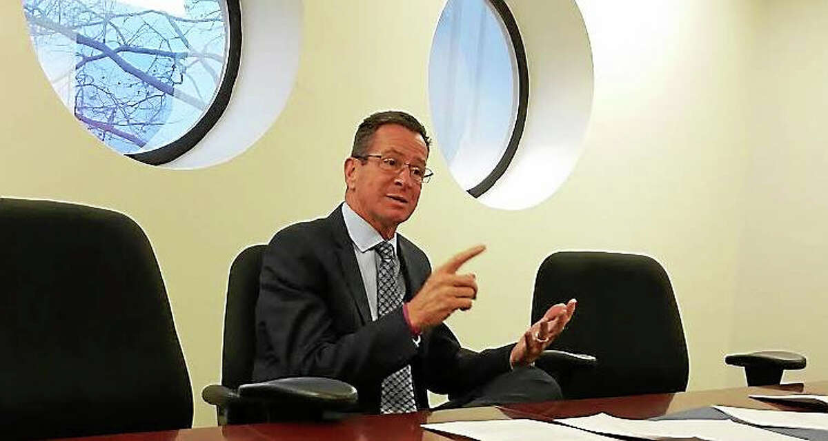 SHAHID ABDUL-KARIM — NEW HAVEN REGITER Connecticut Gov. Dannel Malloy makes a point during a meeting Tuesday with the New Haven Register’s editorial board.