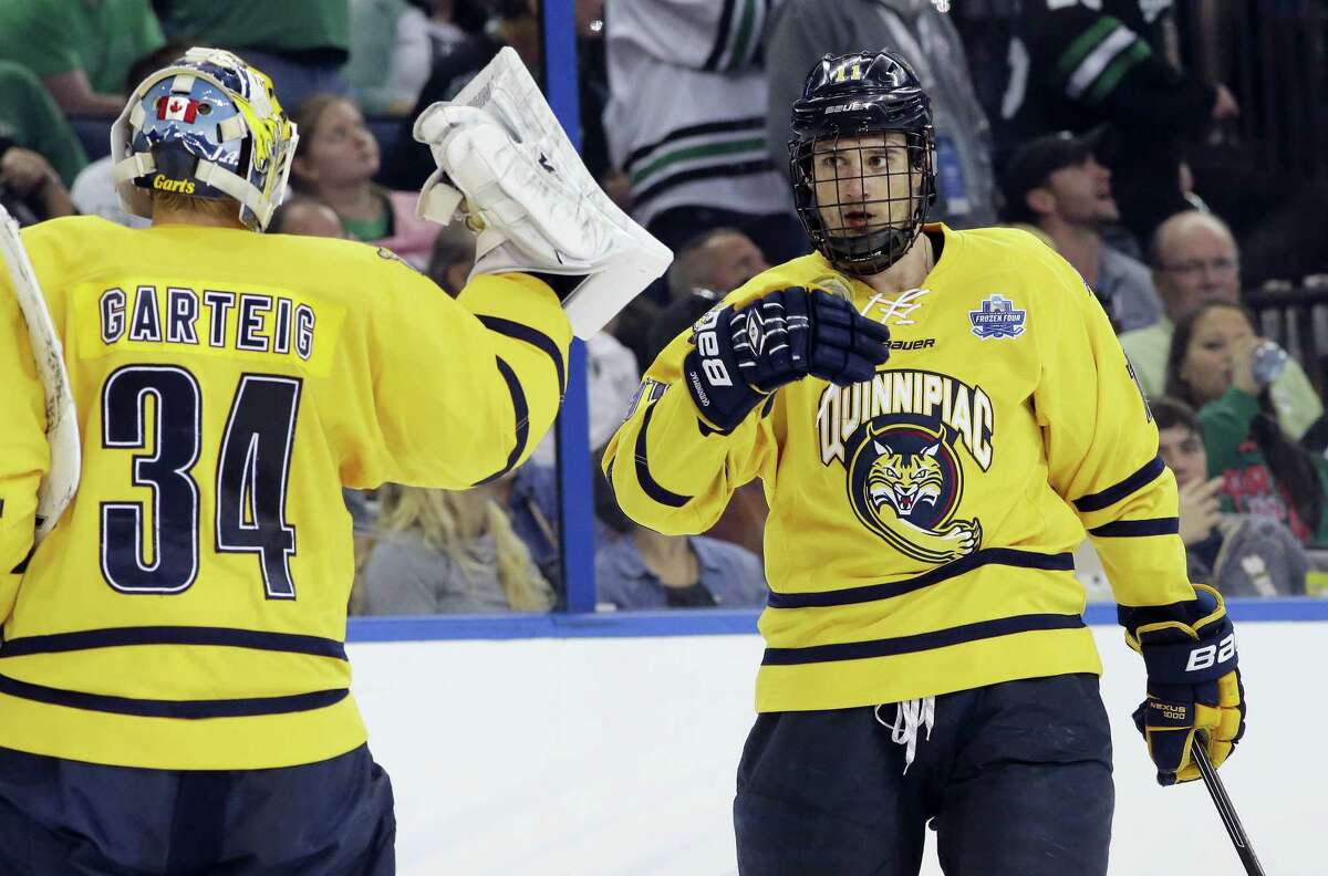 Quinnipiac forward Tim Clifton, right, announced on Friday that he will return for his senior season with the Bobcats.