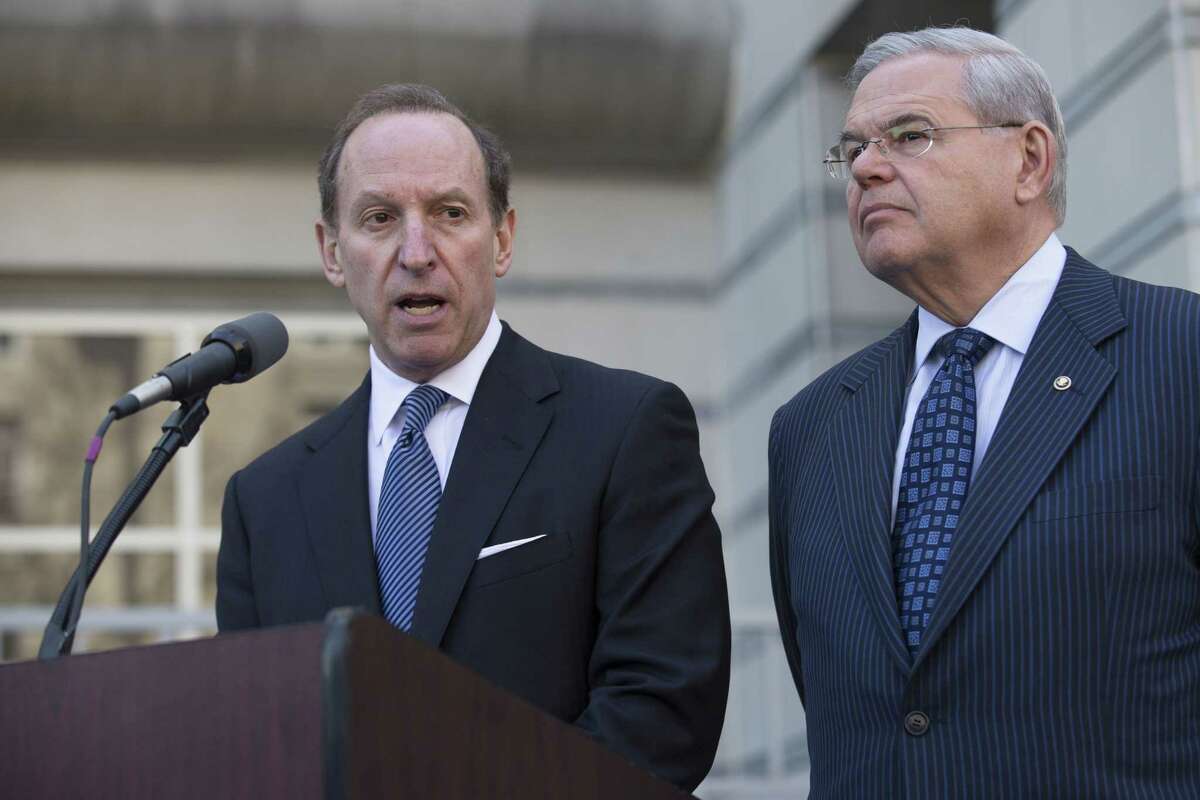 Attorney Abbe Lowell speaks alongside U.S. Sen. Bob Menendez after leaving the Martin Luther King Jr. Federal Courthouse following his client’s arraignment Thursday.