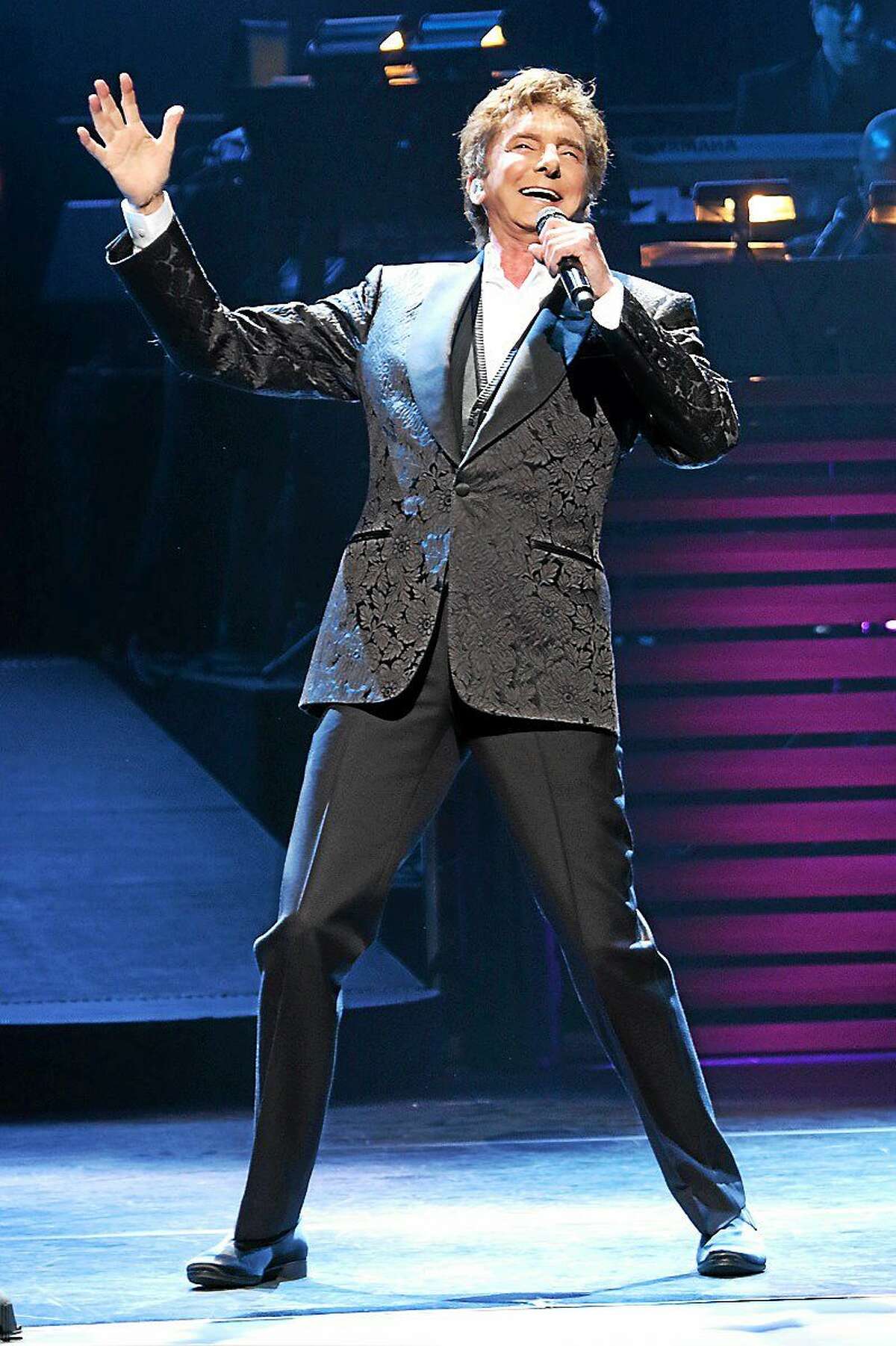 Photo by John Atashian Singer and songwriter Barry Manilow is shown performing on stage at the Foxwoods Resort & Casino in Mashantucket during his concert on March 28. At 71 years old with 51 years in the music business, this living legend is still going strong. He entertained the sold-out crowd of fans to a night full of his biggest hits.