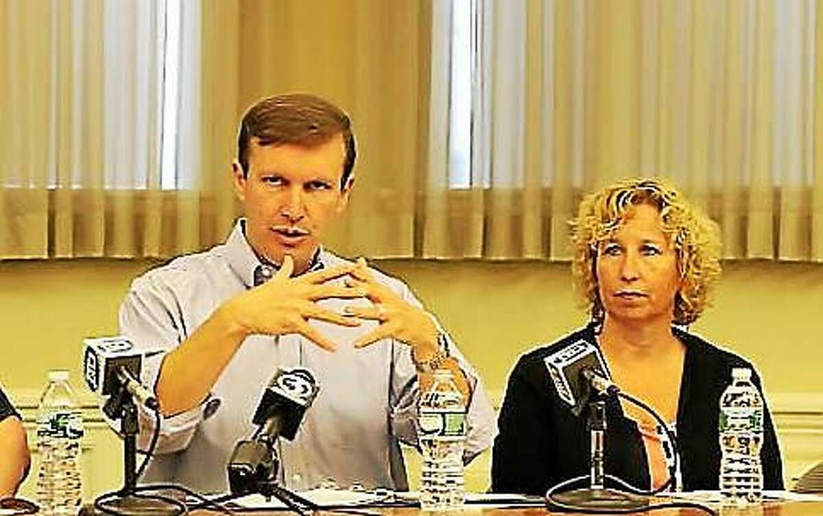 U.S. Sen. Chris Murphy and Mary Kate Mason of the Department of Mental Health and Addiction Services,