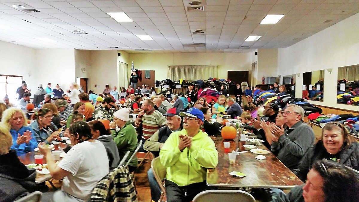 File Photo - The Register Citizen Rally participants enjoy lunch at the Knights of Columbus hall at last year's event.
