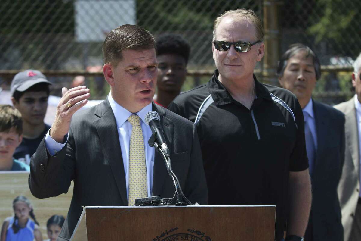 Boston Mayor Martin J. Walsh, joined by former Red Sox pitcher Curt Schilling, speaks during a press conference Wednesday about his proposal to ban snuff and chewing tobacco in city ballfields, including Fenway Park.