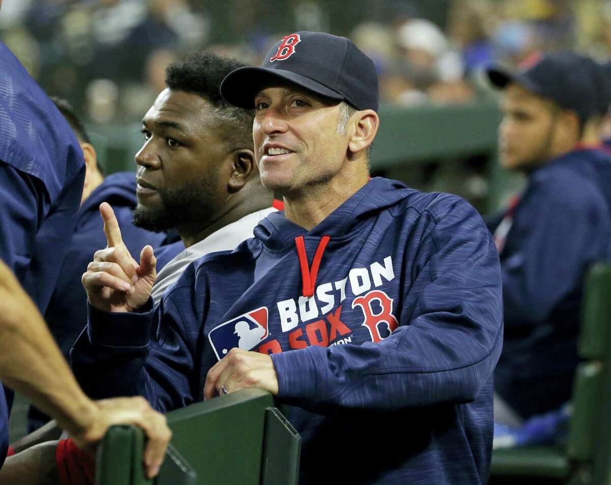 The Arizona Diamondbacks hired Red Sox bench coach Torey Lovullo as their new manager on Friday.