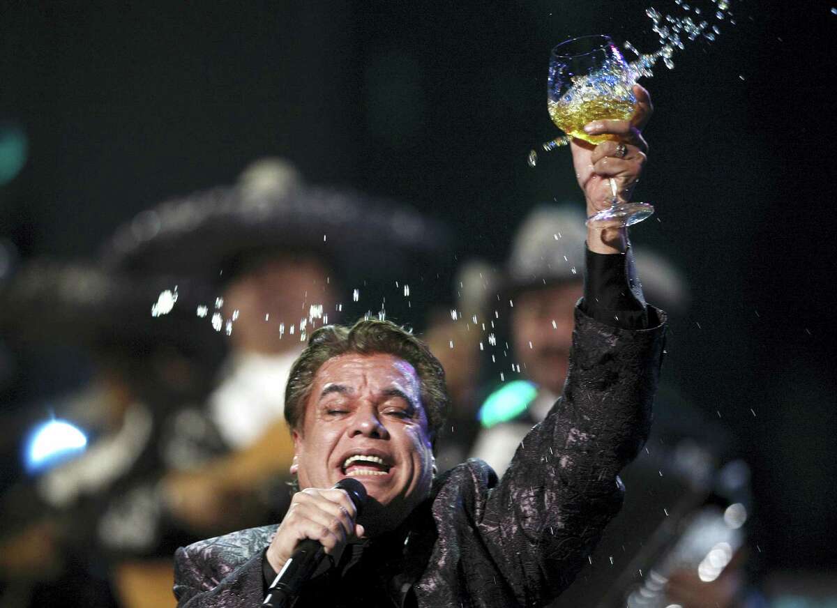 In this Nov. 5, 2009 photo, Juan Gabriel performs at the 10th Annual Latin Grammy Awards in Las Vegas.