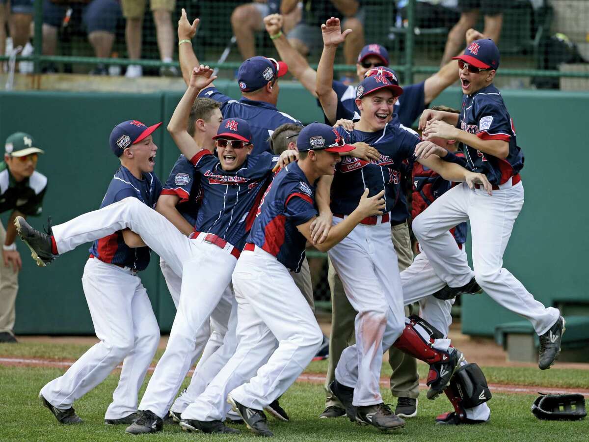 Members of the Endwell, N.Y., team celebrate their win over South Korea in Sunday’s championship game at the Little League World Series.