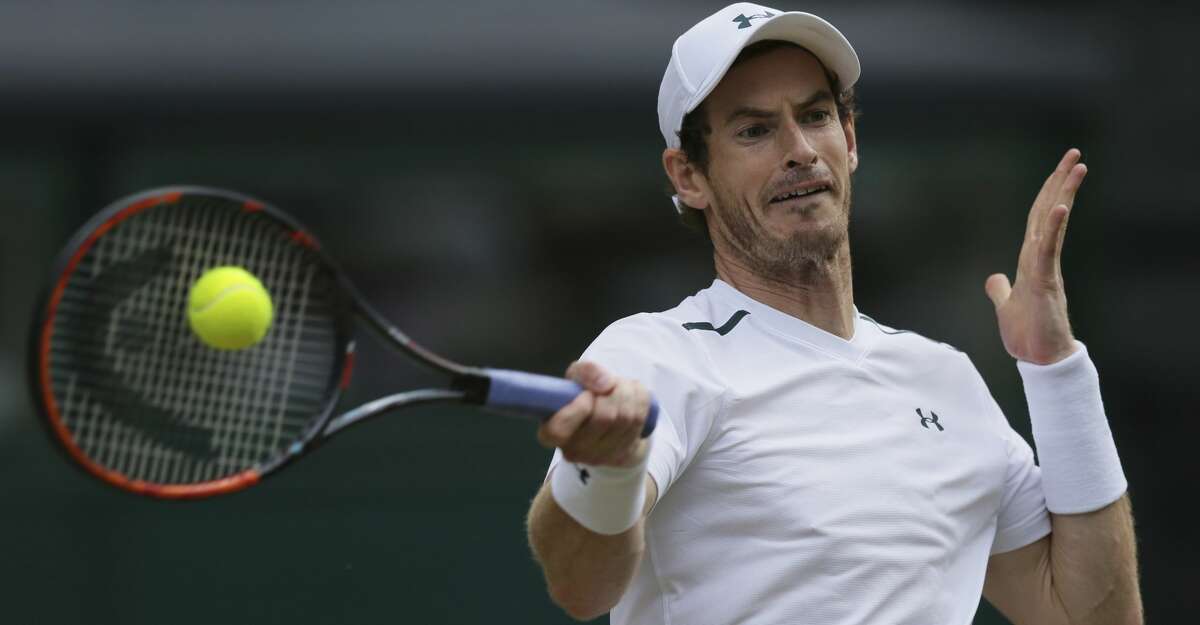 FILE - This July 12, 2017 file photo shows Britain's Andy Murray returning to Sam Querrey of the United States during their Men's Singles Quarterfinal Match at the Wimbledon Tennis Championships in London. Murray surprisingly announced his withdrawal from the U.S. Open on Saturday, Aug. 26, 2017 because of a hip injury. (AP Photo/Tim Ireland, file)