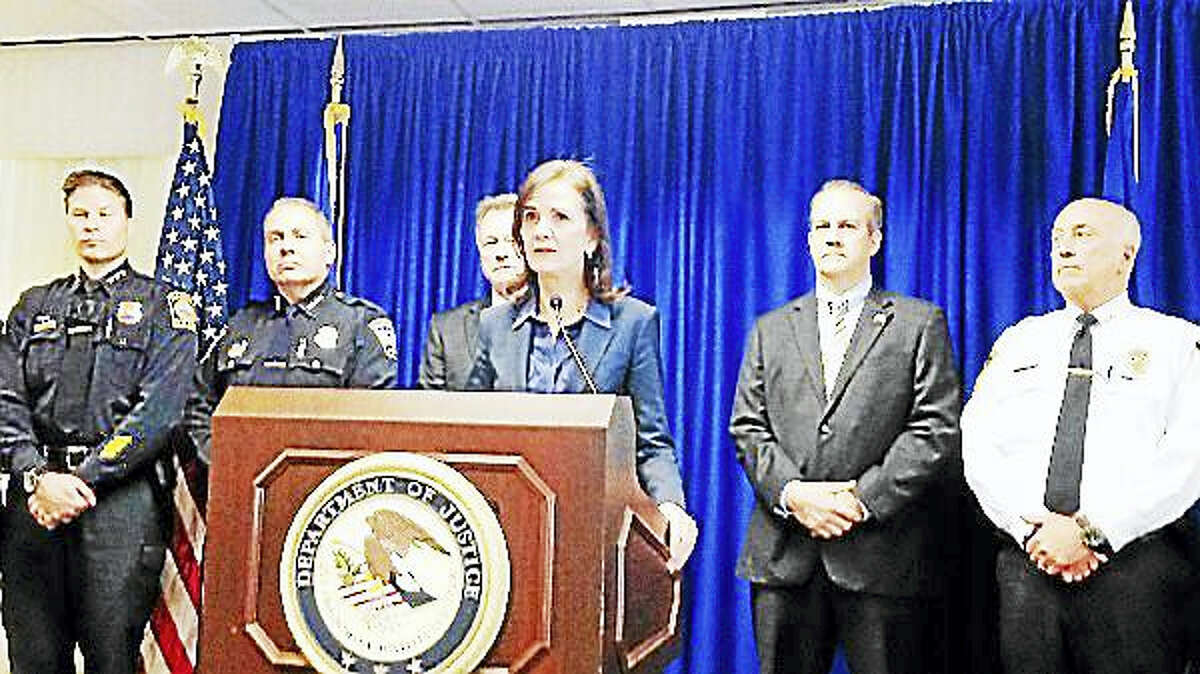 U.S. Attorney Deidre Daly, center, is joined by Hamden Police Chief Thomas Wydra, Torrington Police Chief Michael Maniago, Deputy Chief State’s Attorney Leonard Boyle, DEA Assistant Special Agent in Charge Brian Boyle and East Hartford Deputy Chief Beau Thurnauer.