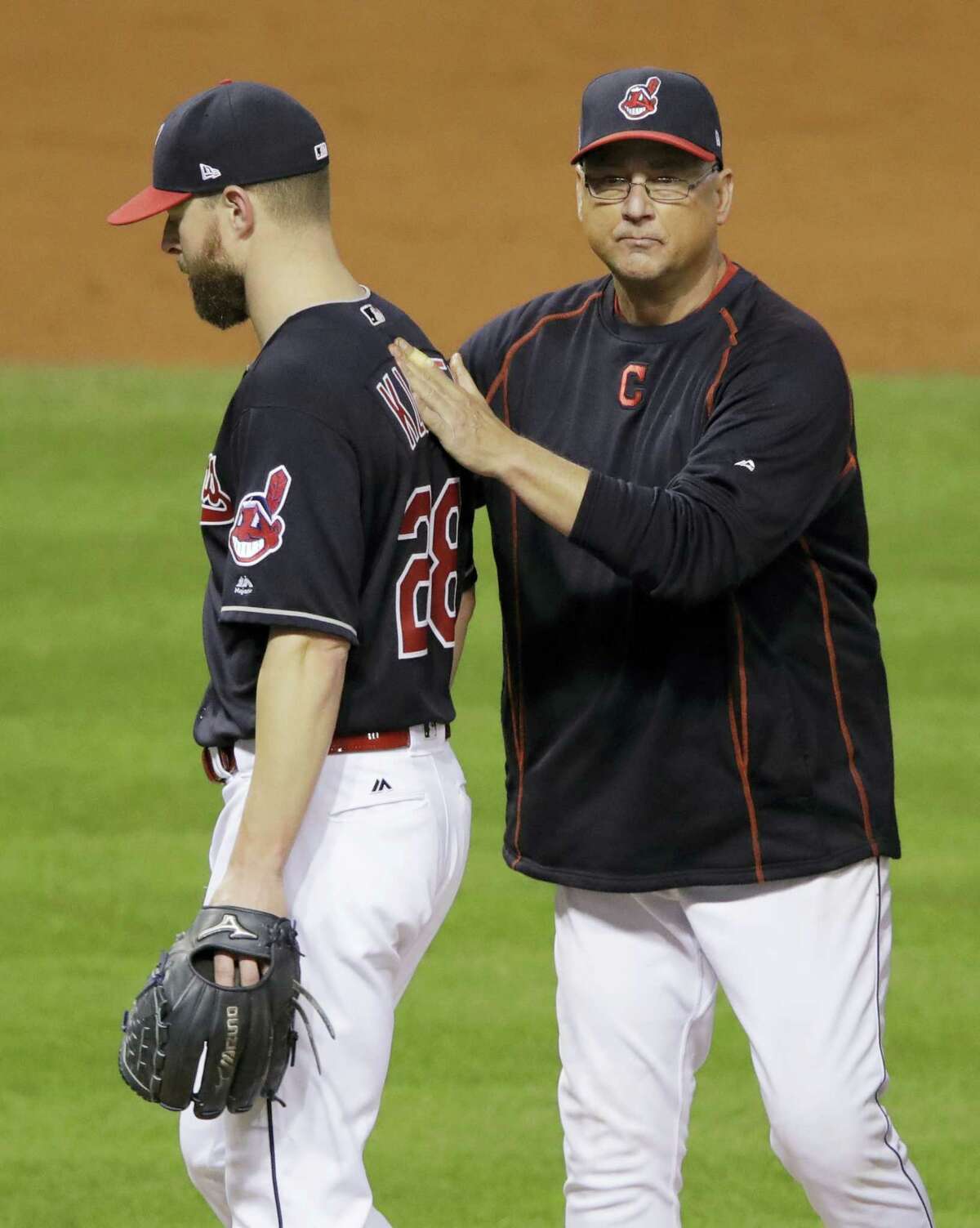Indians manager Terry Francona takes starting pitcher Corey Kluber out of the game during the fifth inning of Game 7 on Wednesday.