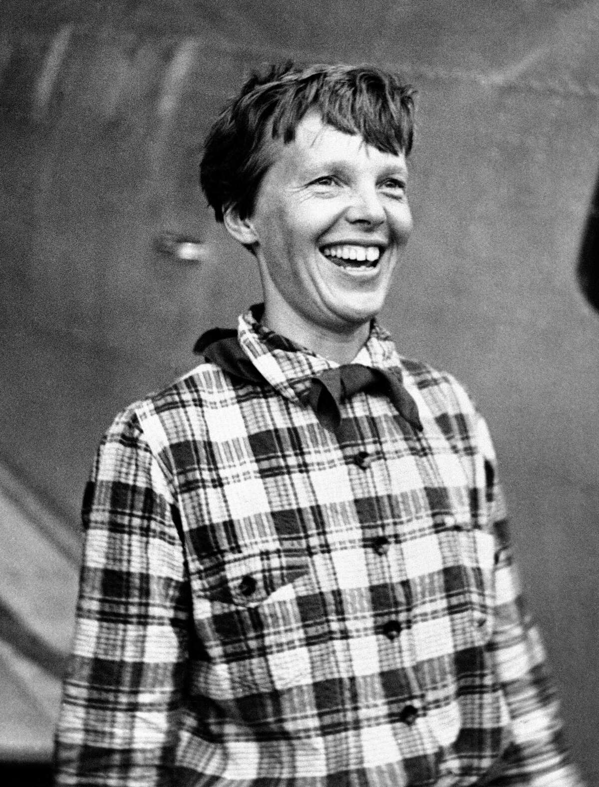 In this June 6, 1937, file photo, Amelia Earhart, the American airwoman who was flying round the world, arrived at Port Natal, Brazil, and took off on her 2,240-mile flight across the South Atlantic to Dakar, Africa. A group investigating the mystery of what happened to Amelia Earhart announced on Oct. 22, 2016, that it has uncovered another connection between the pioneering female pilot and a body found 76 years ago on a remote Pacific island.