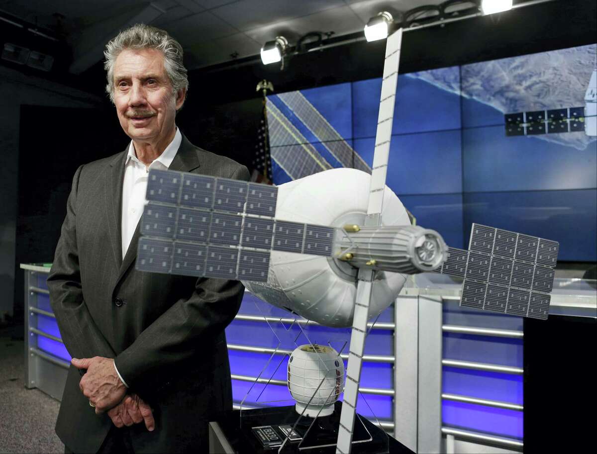Robert Bigelow, founder and president of Bigelow Aerospace stands next to a model of an inflatable habitat that could be used for future space exploration during a news conference at the Kennedy Space Center in Cape Canaveral, Fla. on April 7, 2016.