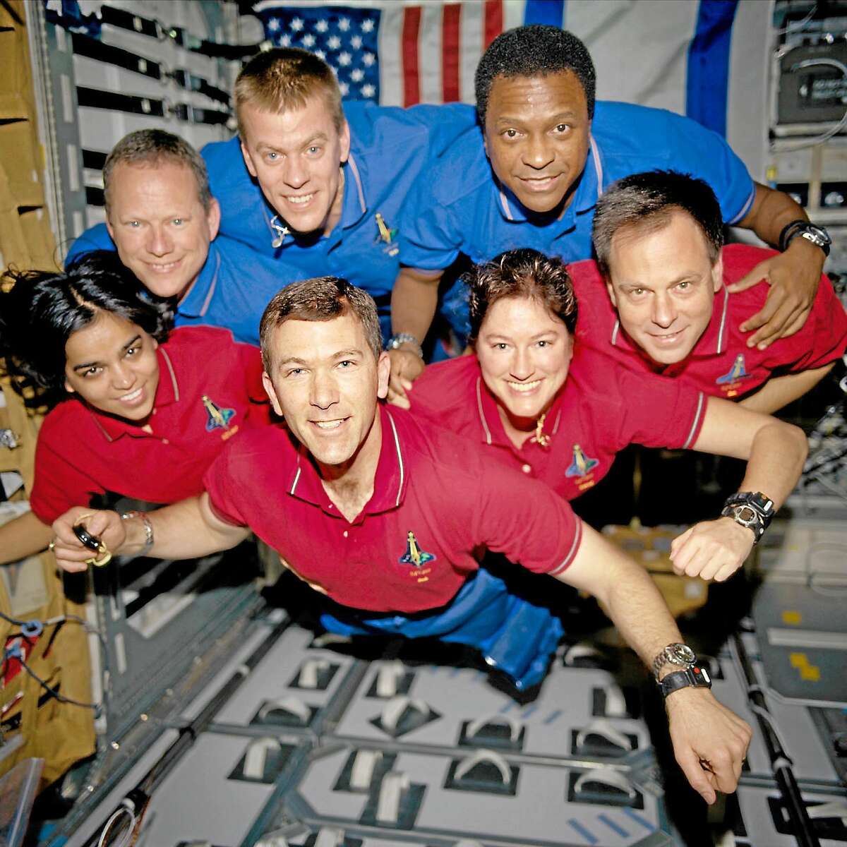 Associated Press ¬ This photo provided by NASA in June 2003 shows the Columbia crew. This picture was on a roll of unprocessed film later recovered by searchers from the debris. From the left are astronauts Kalpana Chawla, mission specialist; Rick D. Husband, mission commander; Laurel B. Clark, mission specialist; and Ilan Ramon, payload specialist. From the left (top row) are astronauts David M. Brown, mission specialist; William C. McCool, pilot; and Michael P. Anderson, payload commander.