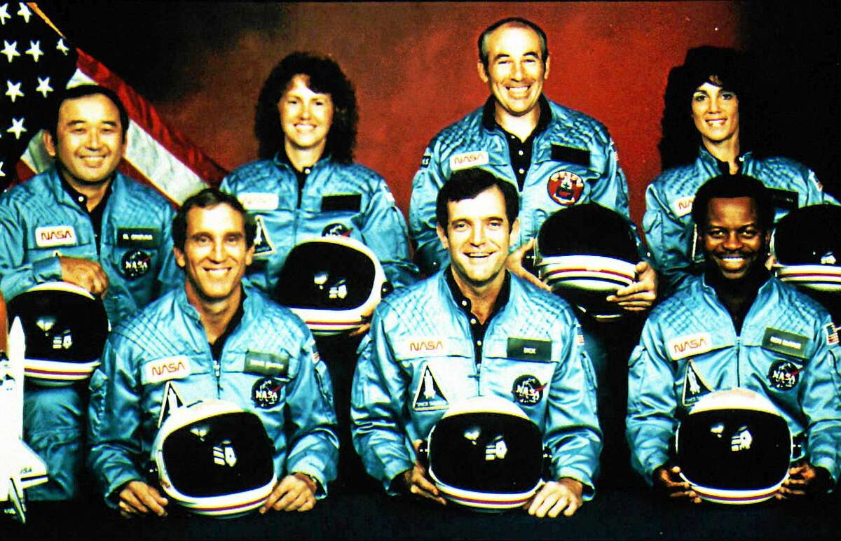 File picture from January 28, 1986 shows the crew of space shuttle Challenger. The space shuttle with seven astronauts on board exploded over Cape Canaveral/Florida 74 seconds after launch. All occupants were killed. In the front row, from left: Astronauts Mike Smith, Francis R. Scobee, Ronald E.McNair. Back row from left: Ellison S. Onizuka, Christa McAuliffe, Gregory Jarvis and Judy Resnik.