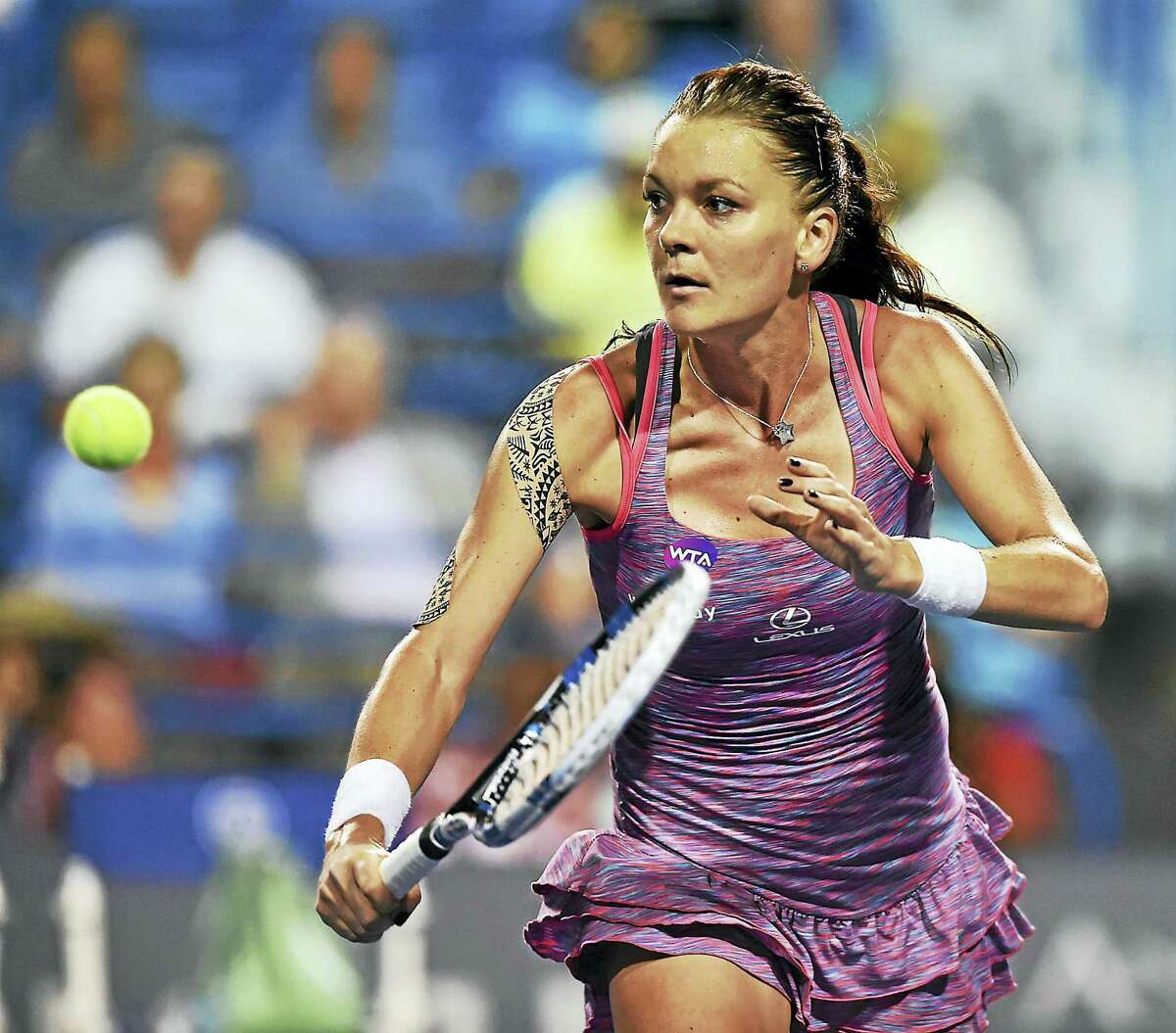 Agnieszka Radwanska defeated Belgium’s Kristen Flipkens in a quarterfinal match on Thursday.