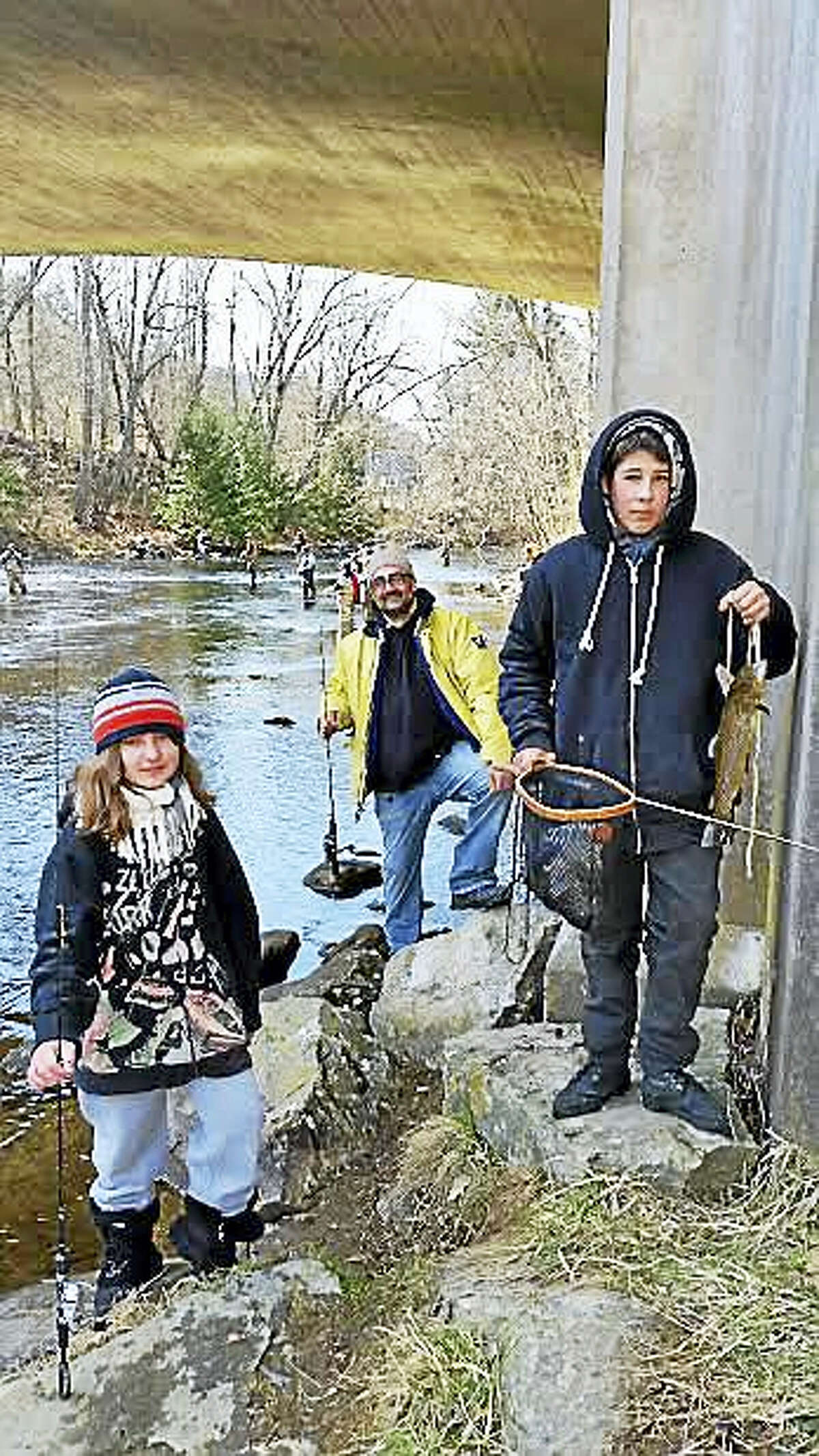 Azyda Lynt, 11, of Terryville; Derek Paplauskas of Terryville; and Robert Valentine, 16, of Waterbury participated in the 67th annual Riverton Fishing Derby on the West branch of the Farmington River near the Old Riverton Inn at 436 E. River Road in Riverton Saturday.