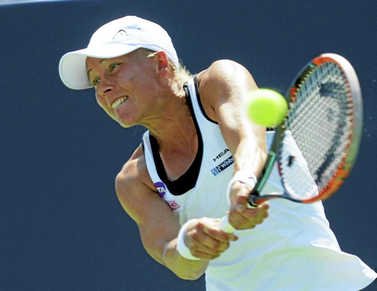 Johanna Larsson hits a backhand return to Shelby Rogers at the Connecticut Open Wednesday.