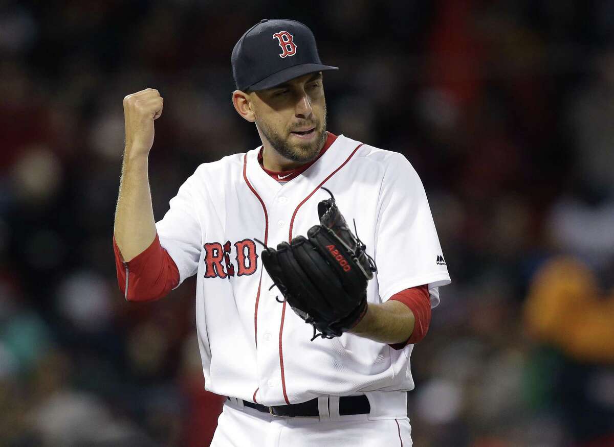 Boston Red Sox relief pitcher Matt Barnes celebrates as he steps off the mound after giving up no hits to the Chicago Cubs in the eighth inning of a baseball game, Sunday, April 30, 2017, in Boston. The Red Sox won 6-2. (AP Photo/Steven Senne)