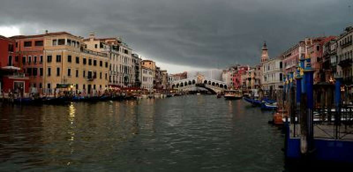The Rialto Bridge in Venice, Italy. A top maker of amusement park rides unveiled a controversial project Wednesday to transform a "rubbish island" in Venice into a cultural attraction, insisting the floating city would not be blemished by a fun park.