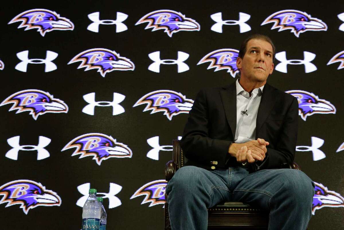 Baltimore Ravens owner Steve Bisciotti listens to a reporter’s question at a news conference on Monday.
