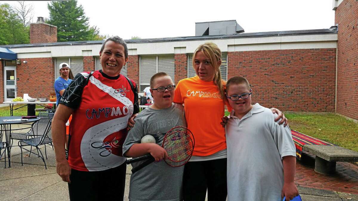 Colleen Renzullo, 52, of Torrington, Daniel Burr, 10, Colleen’s daughter Stephanie Renzullo, 21, Caleb Burr, 10, are shown at Sunday’s Mile 4 Moe 5K race at the University of Connecticut Torrington campus, to raise money for Camp Moe and encourage inclusive activities for children with special needs.