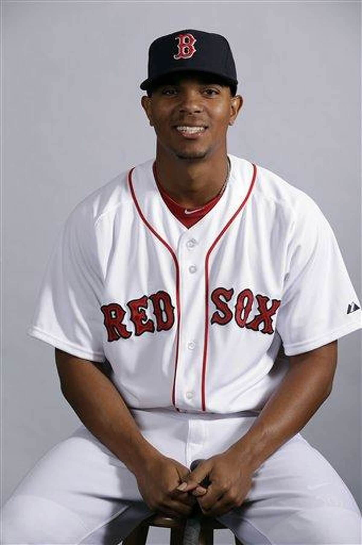 FILE - This Feb. 17, 2013 file photo shows Boston Red Sox's Xander Bogaerts posing during team photo day in Fort Myers, Fla. Bogaerts, Boston's top prospect, is chugging away at his first spring training, doing whatever he can to impress staff and teammates. Either way, though, he'll soon be headed out of town. (AP Photo/Chris O'Meara, File)