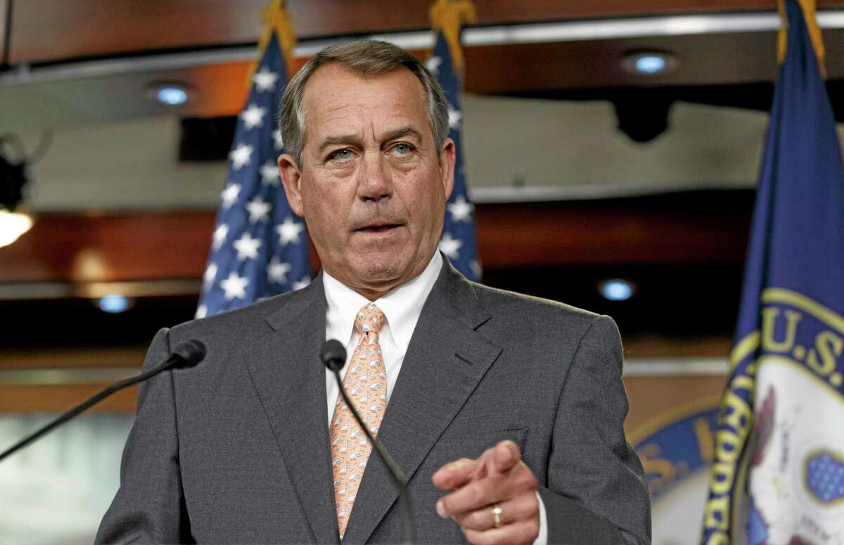 Speaker of the House John Boehner is asked about the special select committee he has formed to investigate the deadly 2012 attack on the U.S. diplomatic post in Benghazi, Libya, raising the stakes in a political battle with the Obama administration as the midterm election season heats up, during a news conference on Capitol Hill in Washington, Thursday, May 8, 2014. The National Republican Congressional Committee has issued a fundraising pitch on its website asking people to become a "Benghazi Watchdog" by donating money to GOP election efforts. Boehner has said that the examination would be "all about getting to the truth" of the Obama administration's response to the attack and would not be a partisan, election-year circus. (AP Photo/J. Scott Applewhite)