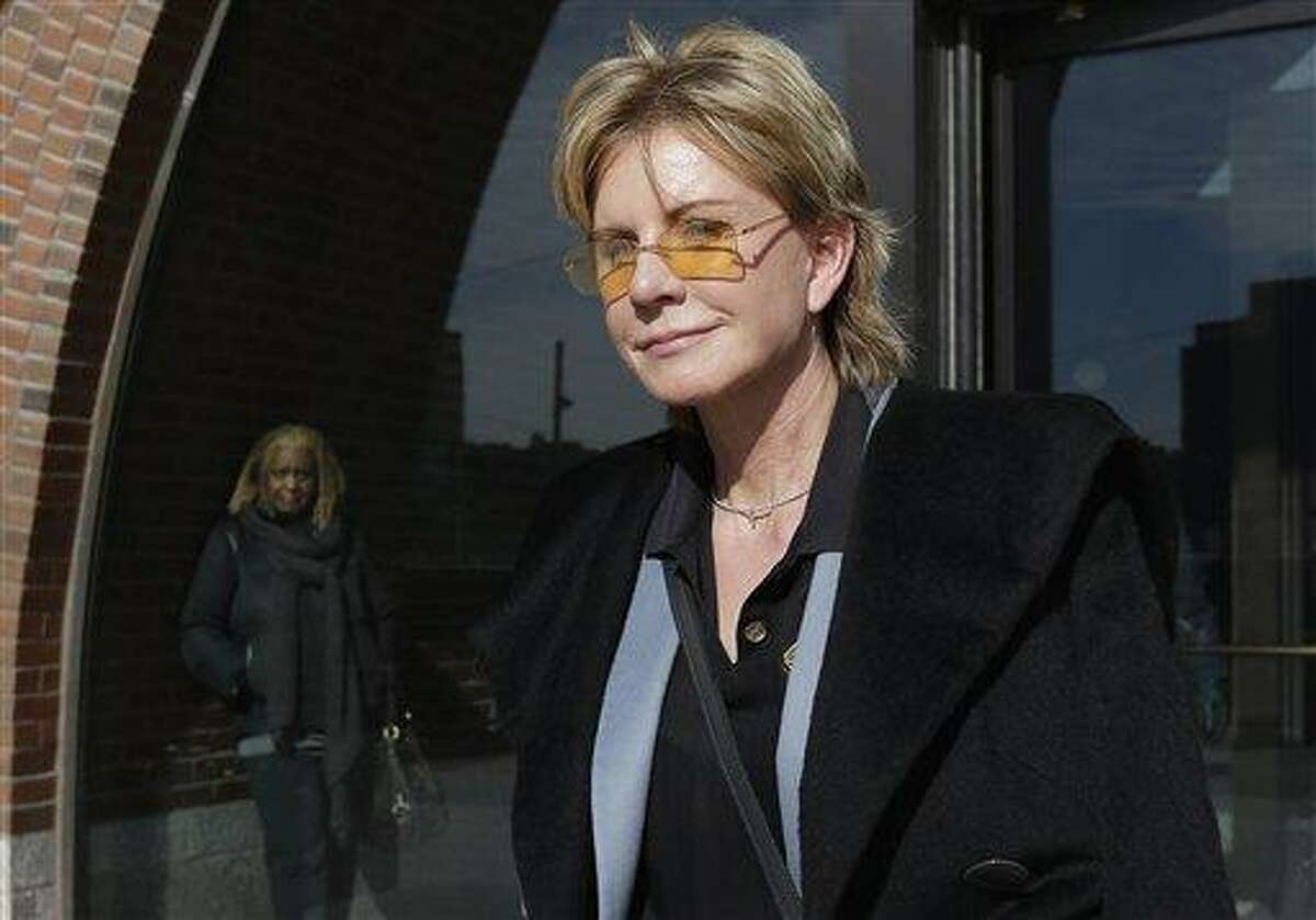 AP Photo/Steven Senne -- In a Feb. 7, file photo, author Patricia Cornwell leaves federal court in Boston after she took the stand in her lawsuit against her former financial management company. A federal jury awarded crime writer Patricia Cornwell nearly $51 million Tuesday, Feb. 19, in her lawsuit against her former financial management company and a former principal in the firm. Cornwell claimed that the firm and a former executive cost her millions of dollars in losses or unaccounted revenue during their four-year relationship.
