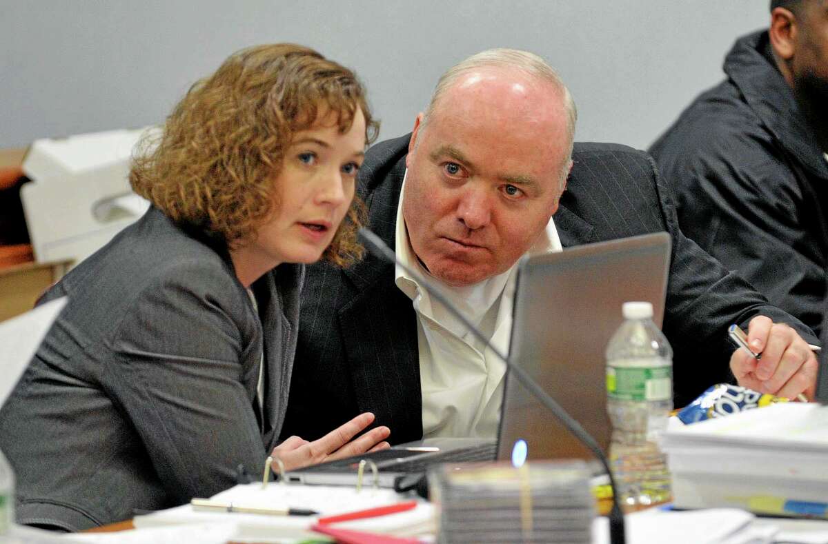 FILE - In a Friday, April 26, 2013 file photo, Michael Skakel, right, talks to Jessica Santos, one of his defense attorneys, during his appeal at State Superior Court in Vernon, Conn. On Wednesday, Oct. 23, 2013, Skakel's conviction in the death of Moxley was set aside and new trial ordered by a Connecticut judge, Thomas Bishop, who ruled that Sherman failed to adequately represent him when he was found guilty in 2002. Skakel's current attorney, Hubert Santos, said he expects to file a motion for bail on Thursday. If a judge approves it, Skakel could then post bond and be released from prison. (AP Photo/The Stamford Advocate, Jason Rearick, Pool, File)