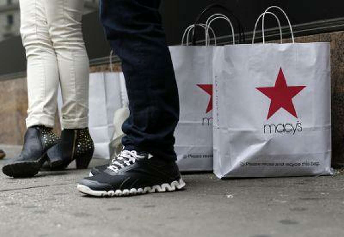 Customers stand outside Macy's store in New York, April 11, 2013. REUTERS/Brendan McDermid
