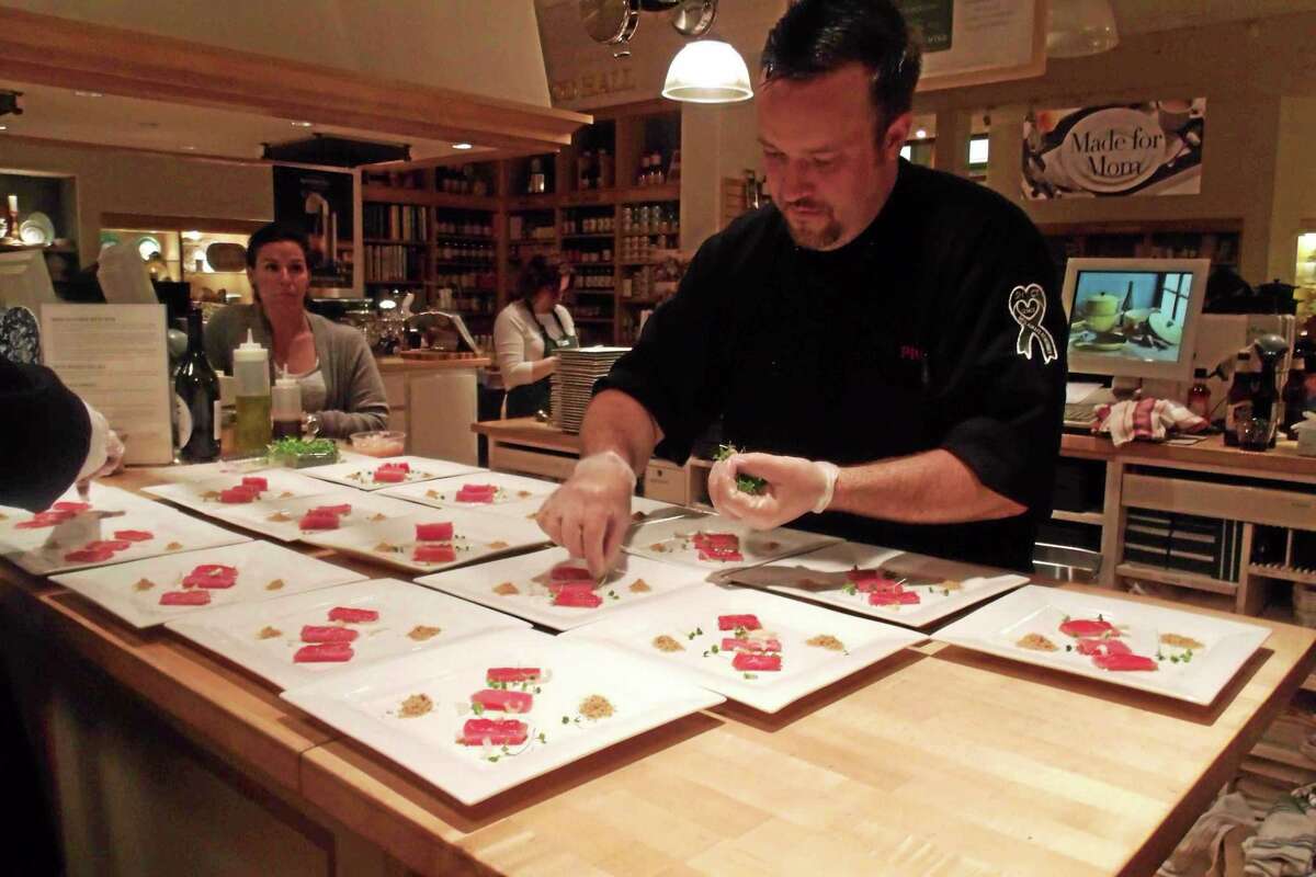 Chef Plum Luv at work at the recent pop-up dinner at the Williams-Sonoma in the Danbury Fair Mall.