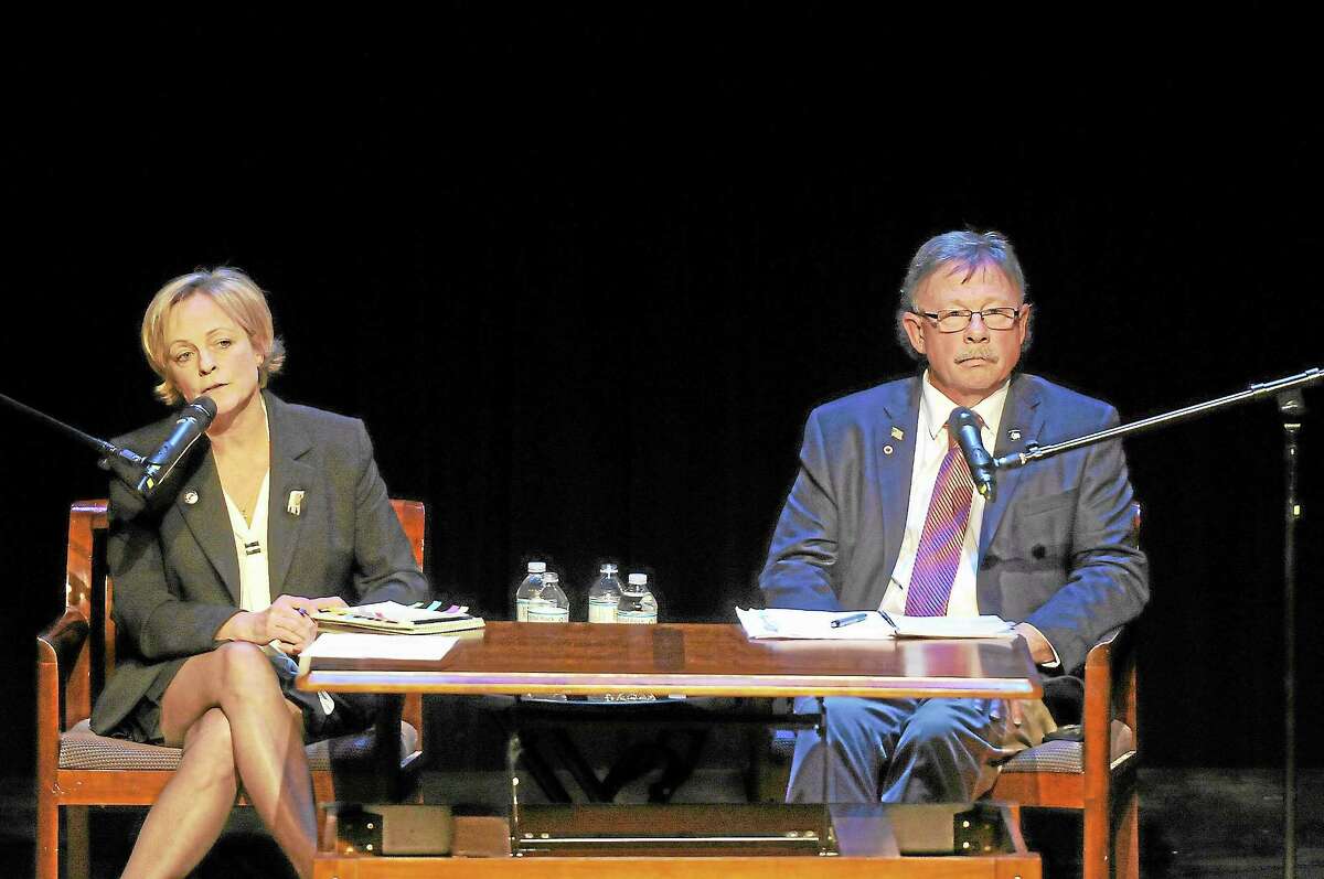 Laurie Gaboardi-Register Citizen ¬ Torrington mayoral candidates Elinor Carbone, a Republican, and Democrat George Craig participated in a debate at the Warner Theatre on Thursday, Oct. 24.