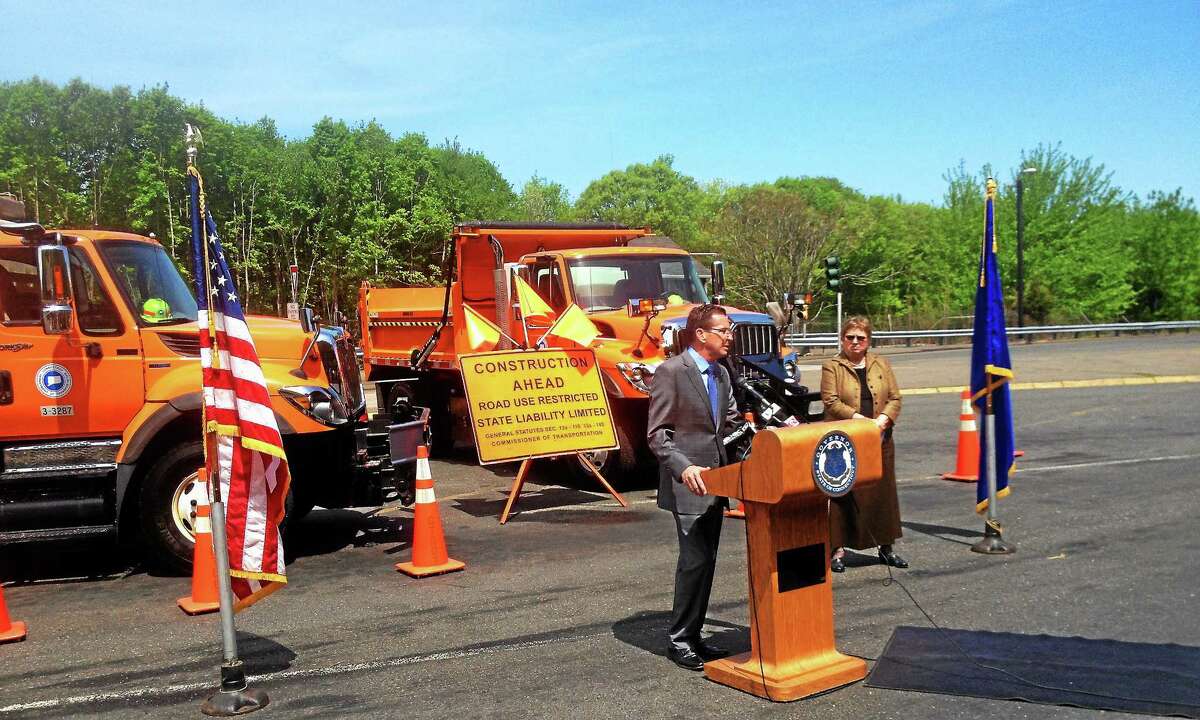 Alex Gecan - The Middletown Press Gov. Dannel Malloy and ConnDOT Deputy Commissioner Anna Barry announced 264 miles of road resurfacing at a press event Wednesday at the Middletown rest area on Interstate 91.