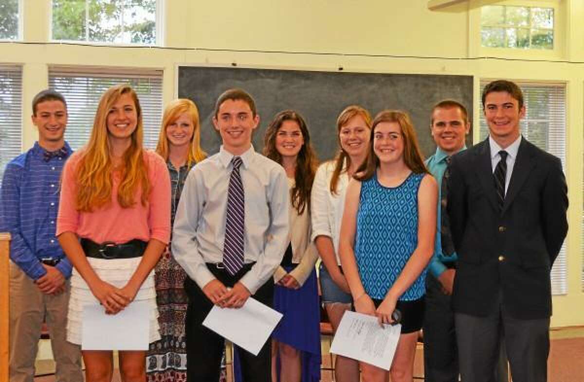 Newly inducted members join the founders of the Safe Harbor Youth Services Bureau Thursday at Harwinton Town Hall. (Kate Hartman-Register Citizen)