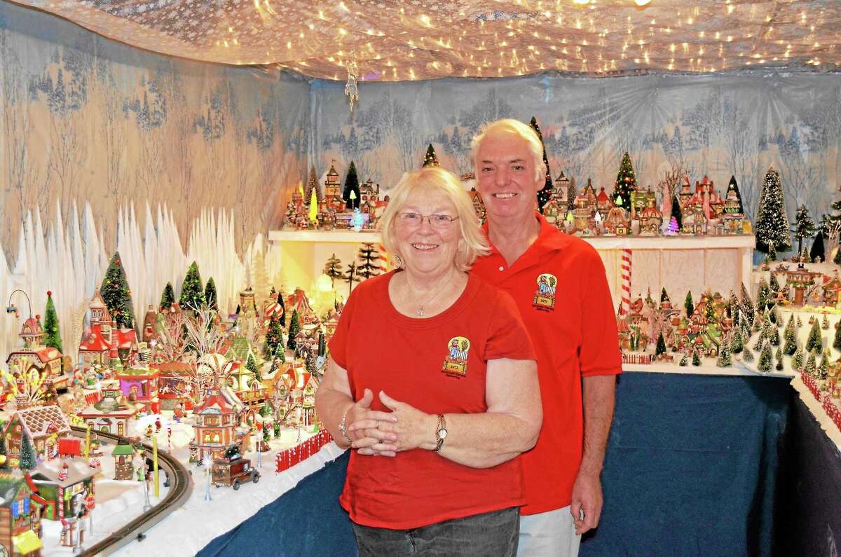 Randy and Penny Miller have a room dedicated to the Department 56 North Pole Village collection in the basement of their New Hartford home.
