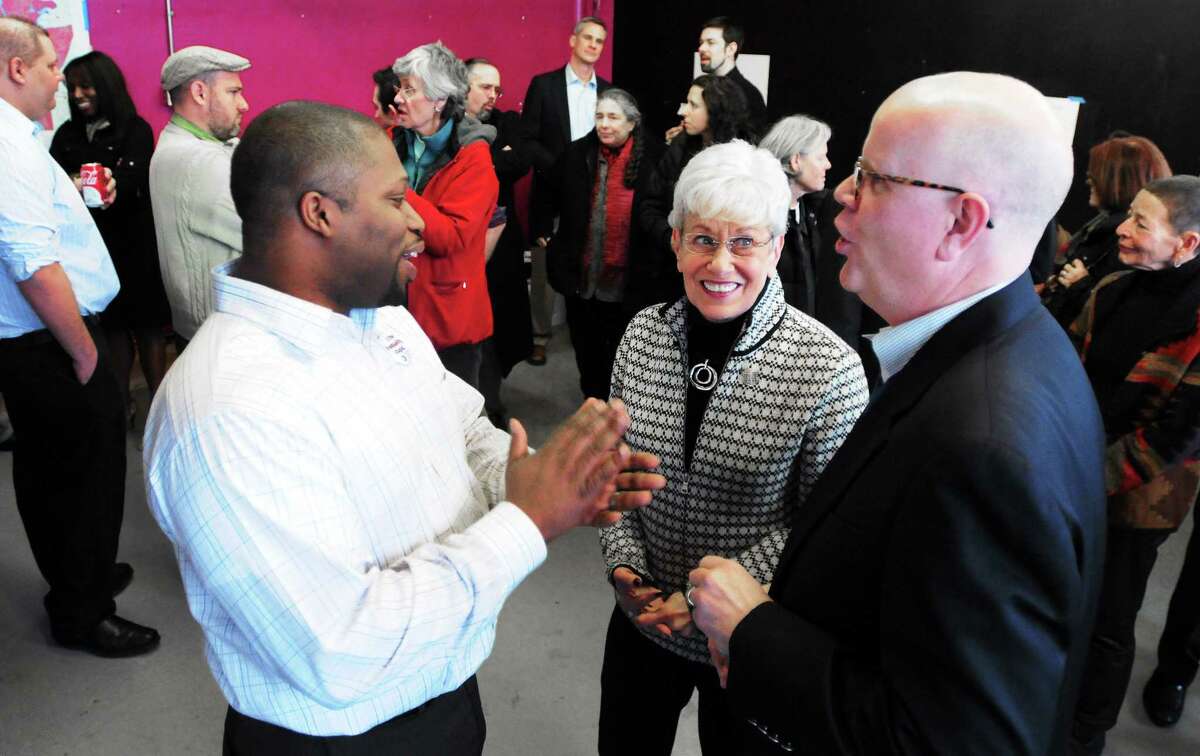 (Photo by Peter Hvizdak ó New Haven Register) Democrat Gary Holder-Winfield, a State Senate candidate for the seat left open when Toni Harp became Mayor of New Haven, left, speaks with Lieutenant Governor Nancy Wyman and Comptroller Kevin Lembo at the grand opening of Holder-Winfield's campaign headquarters Saturday afternoon January 25, 2014 at 117 Whalley Ave. in New Haven.