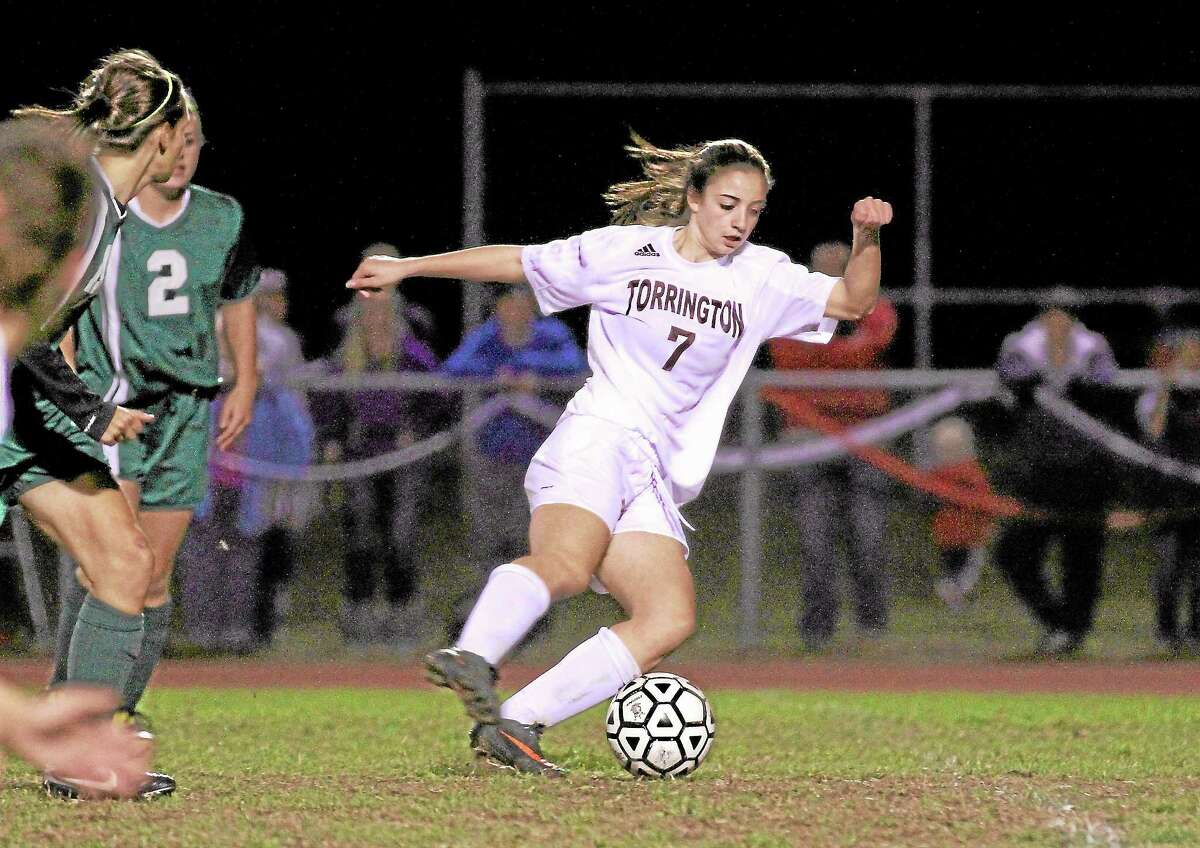 Marianne Killackey — Special to Register Citizen Torrington’s Taylor Pestritto attemps to advance the ball in a game earlier this season.