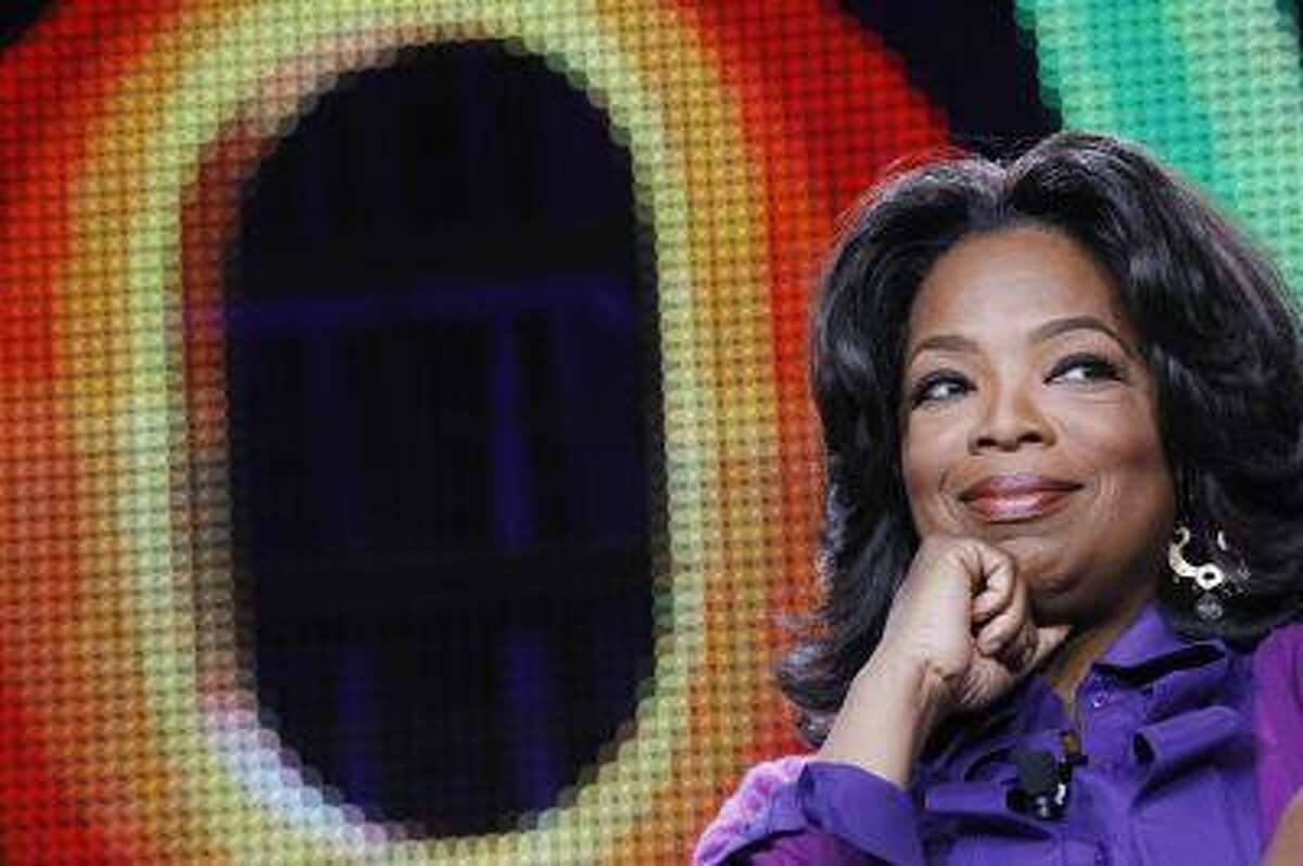 Oprah Winfrey attends a panel during the Oprah Winfrey Network (OWN) Television Critics Association winter press tour in Pasadena, Calif. in this January 6, 2011 file photo. REUTERS/Mario Anzuoni/Files