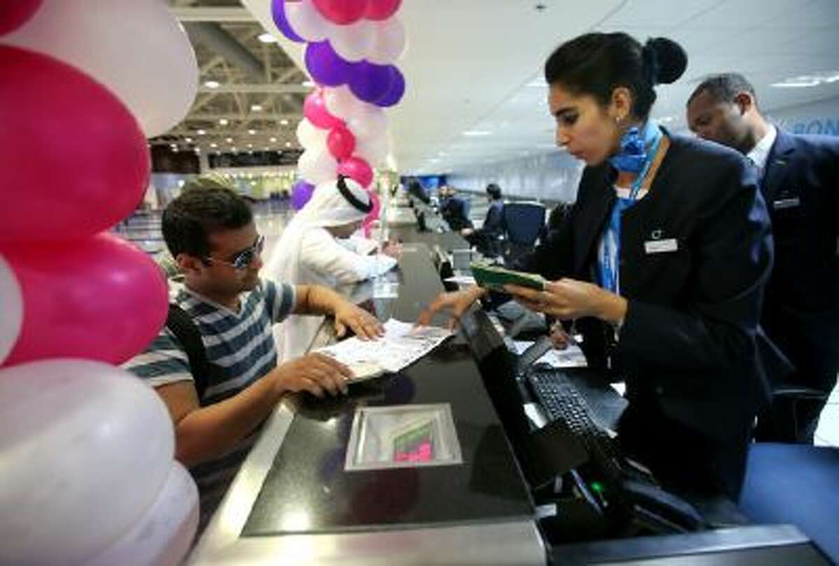 Passengers check-in at the newly opened Al Maktoum International Airport in Dubai, United Arab Emirates, Sunday, Oct. 27, 2013.