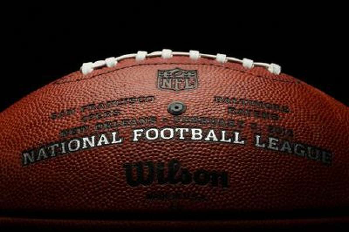 An official game ball for the NFL football Super Bowl XLVII. Tuesday, Jan. 22, 2013. The Wilson Sporting Goods football factory in Ada, Ohio, which has made the official Super Bowl football since the first Super Bowl in 1966, began making the this year's game balls Sunday night immediately after the conclusion of the NFC and AFC championship games.The San Francisco Forty Niners will play the Baltimore Ravens in the Super Bowl on Feb. 3 in New Orleans. (AP Photo/Rick Osentoski)