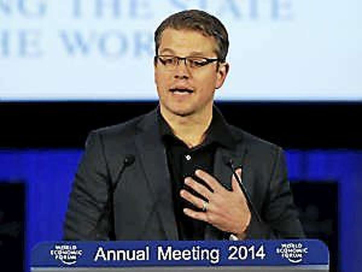 American actor Matt Damon speaks during the Crystal award ceremony at the eve of the opening of the World Economic Forum in Davos, Switzerland Jan. 21, 2014.