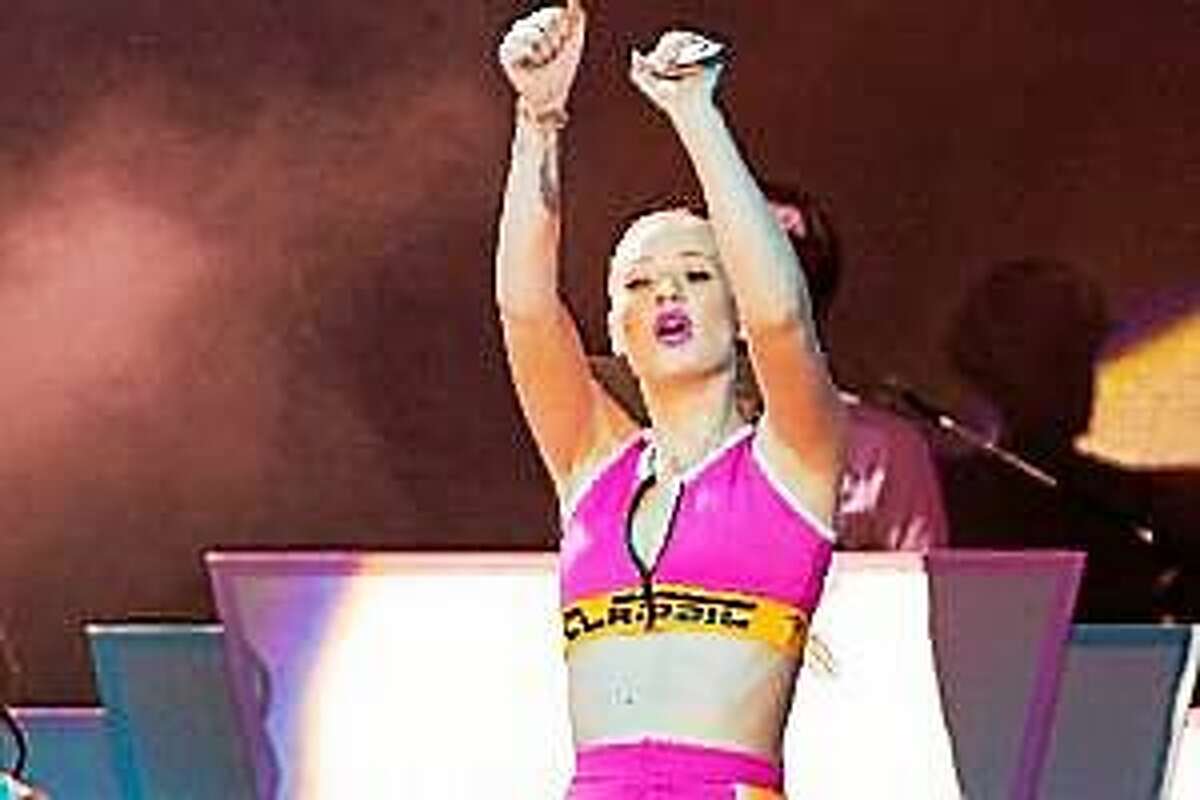 In this Saturday, Aug. 9, 2014 file photo, Iggy Azalea performs in Santa Monica, Calif. On Friday, Aug. 22, 2014.