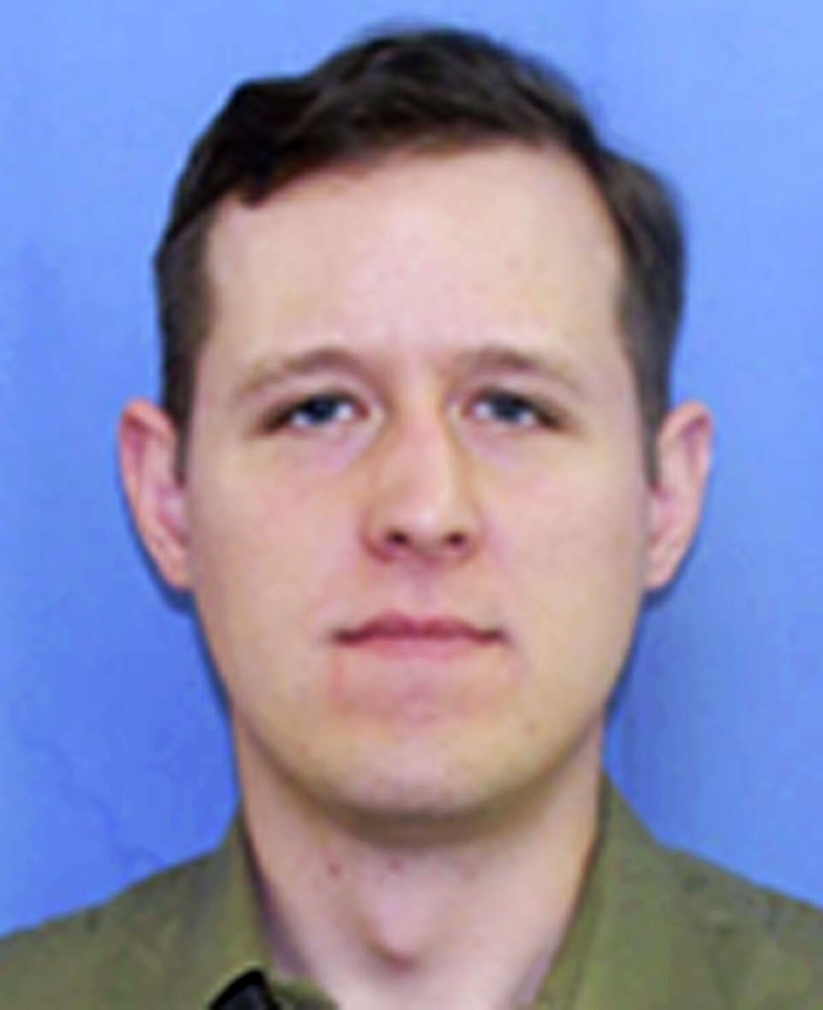 This undated PennDOT identification photo released Tuesday, Sept. 16, 2014, by the Pennsylvania State Police shows Eric Matthew Frein, 31, of Canadensis, Penn., being sought in Friday’s shooting that left one trooper dead and another critically wounded at a state police barracks in Blooming Grove.